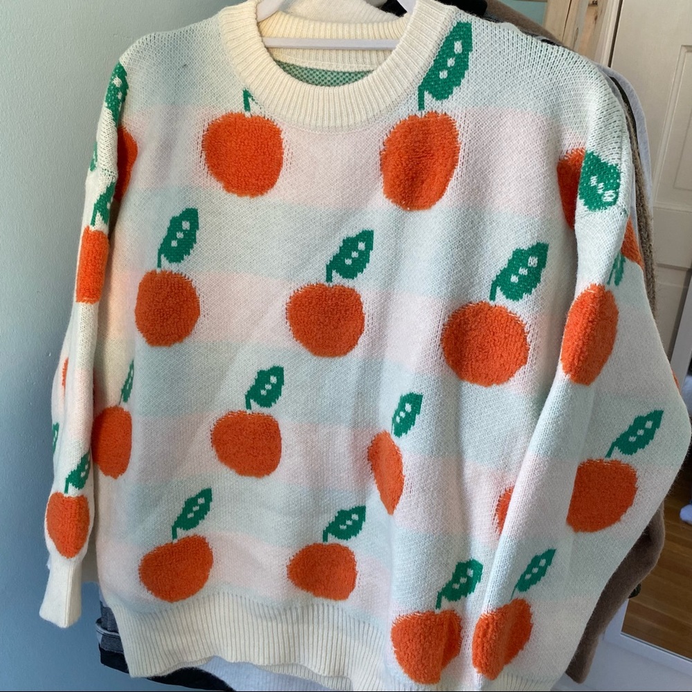 Orange patterned sweater